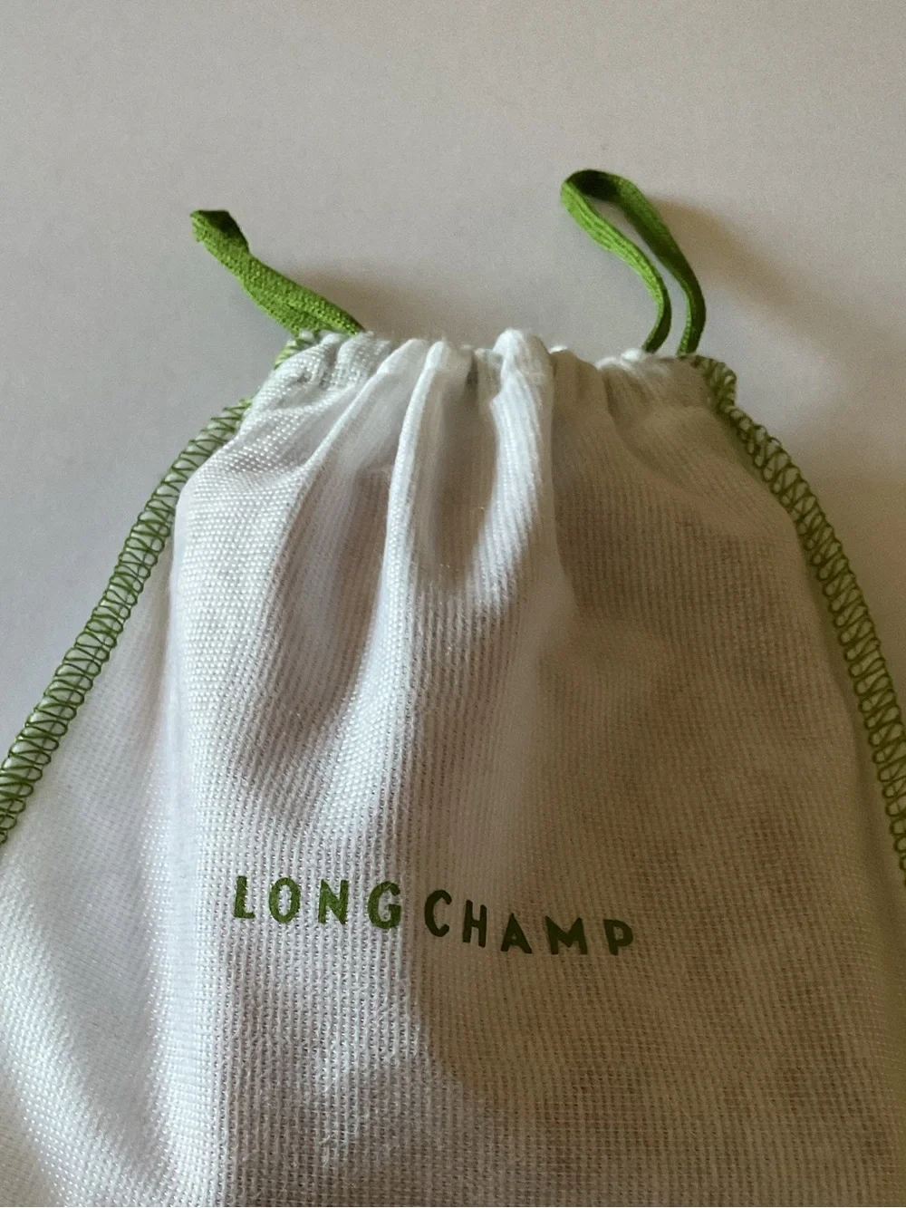 LONGCHAMP PEBBLED LEATHER BIFOLD ZIP AROUND WALLET WITH ID WINDOW AMBER NWOT
